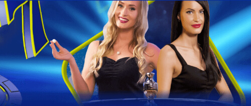 2 female live dealers in black dresses William Hill Casino