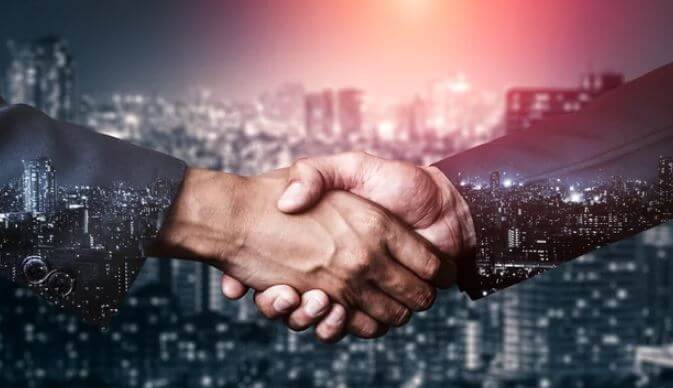 hand shake - microgaming sells Games Portfolio